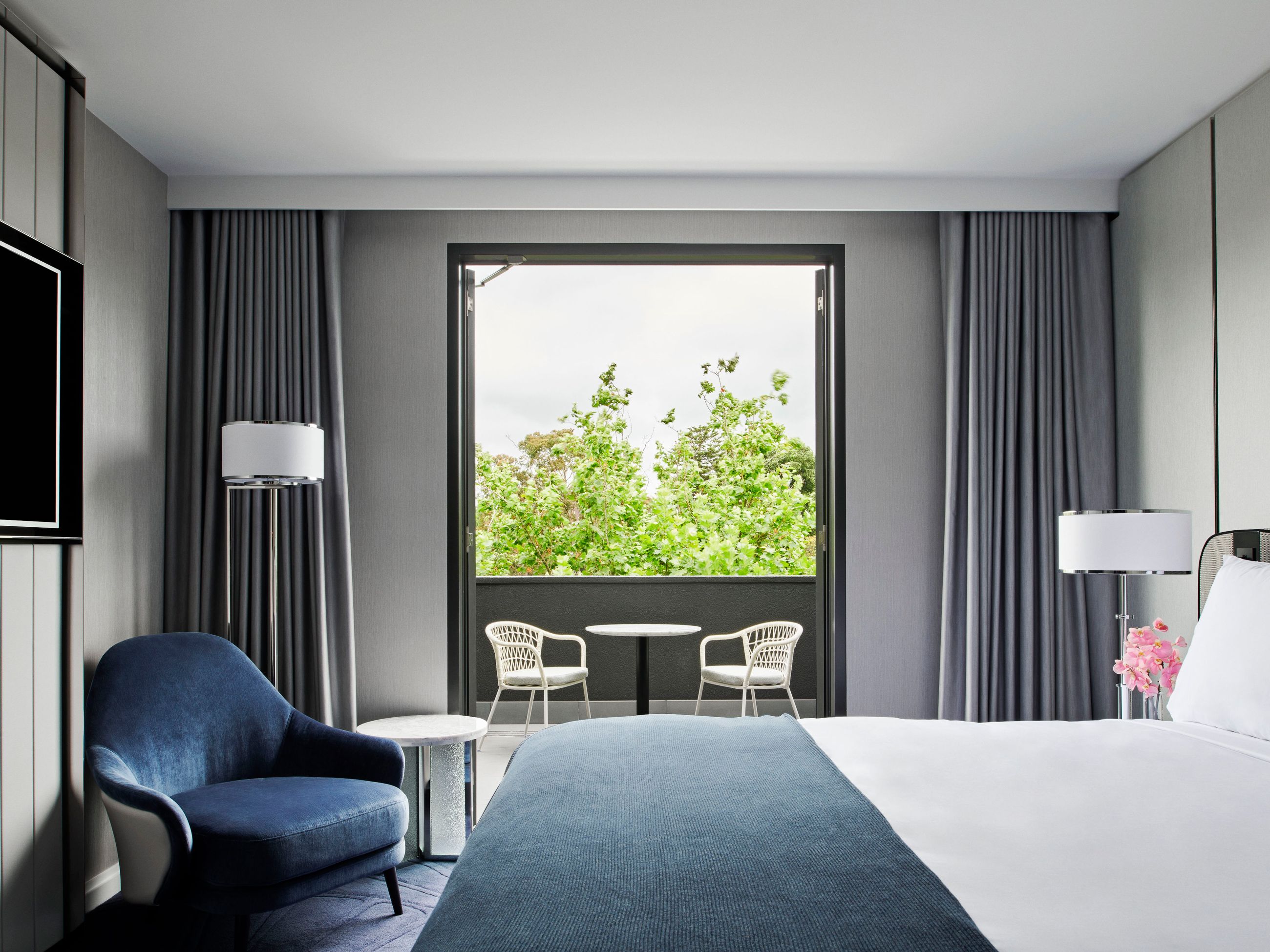 The Royce Melbourne's king room with balcony