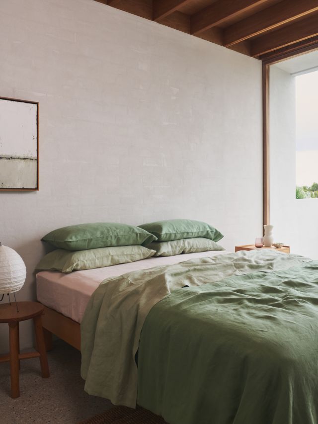 Bedroom with green bedding