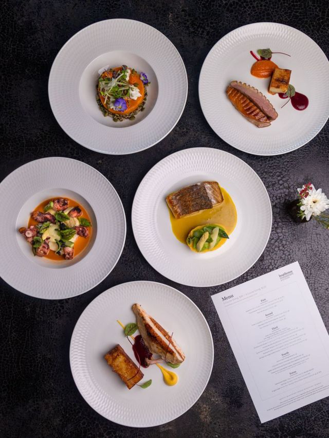 a spread of dishes at Boathouse Restaurant