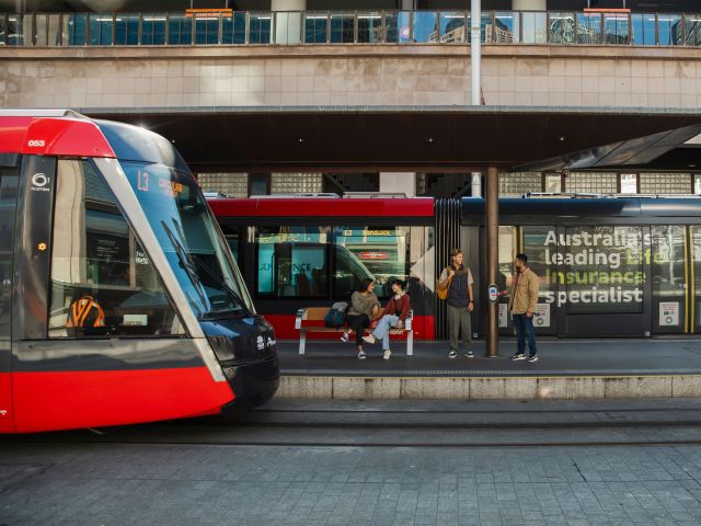 People waiting for the light rail at Circular Quay.