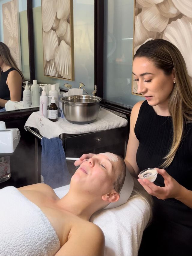 Client getting a facial and glow medispa