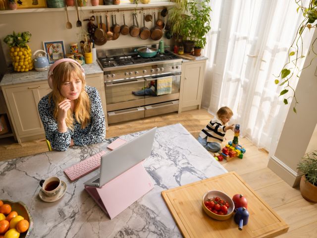 Mum using the casa pop up desk