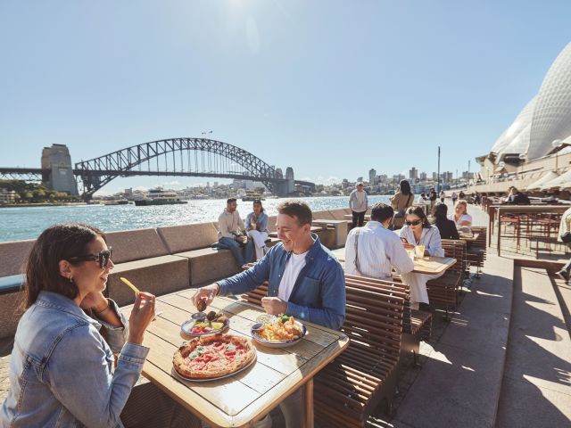 a couple dining at Opera Bar, Bennelong Point