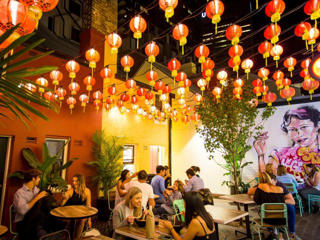 dining under vibrant lanterns at Spice Alley, Chippendale