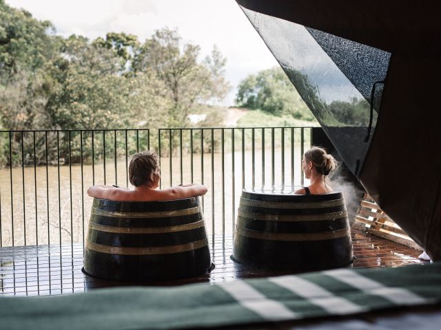 relaxing at bathing barrels in Metung Hot Springs