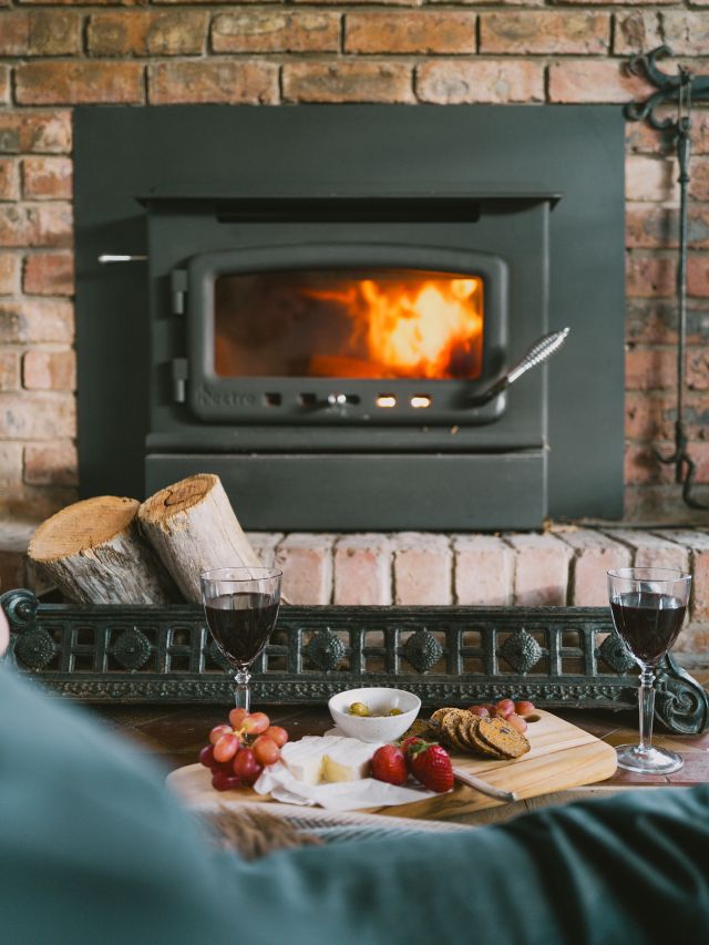 A cosy charcuterie spread by the fireplace.