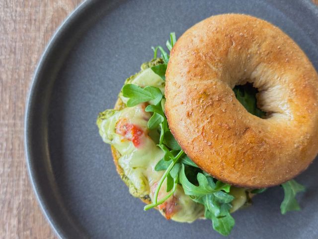 a bagel at Daily Grind Coffee on Main