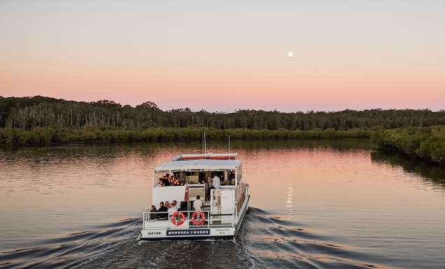 A scenic boat trip during a Noosa getaway.