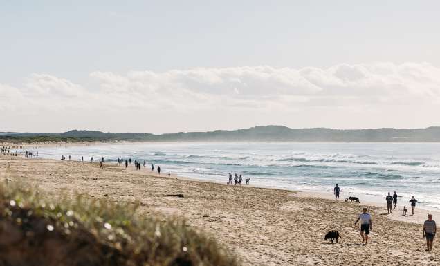 People walking at one of the Best Australian Beaches.