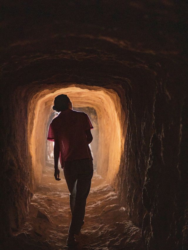 A women inside the Joker's Tunnel in Yalgoo.