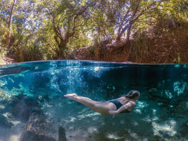 woman swimming in Katherine Hot Springs only in the nt