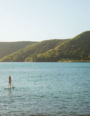 people on sup boards at the sundays hamilton island
