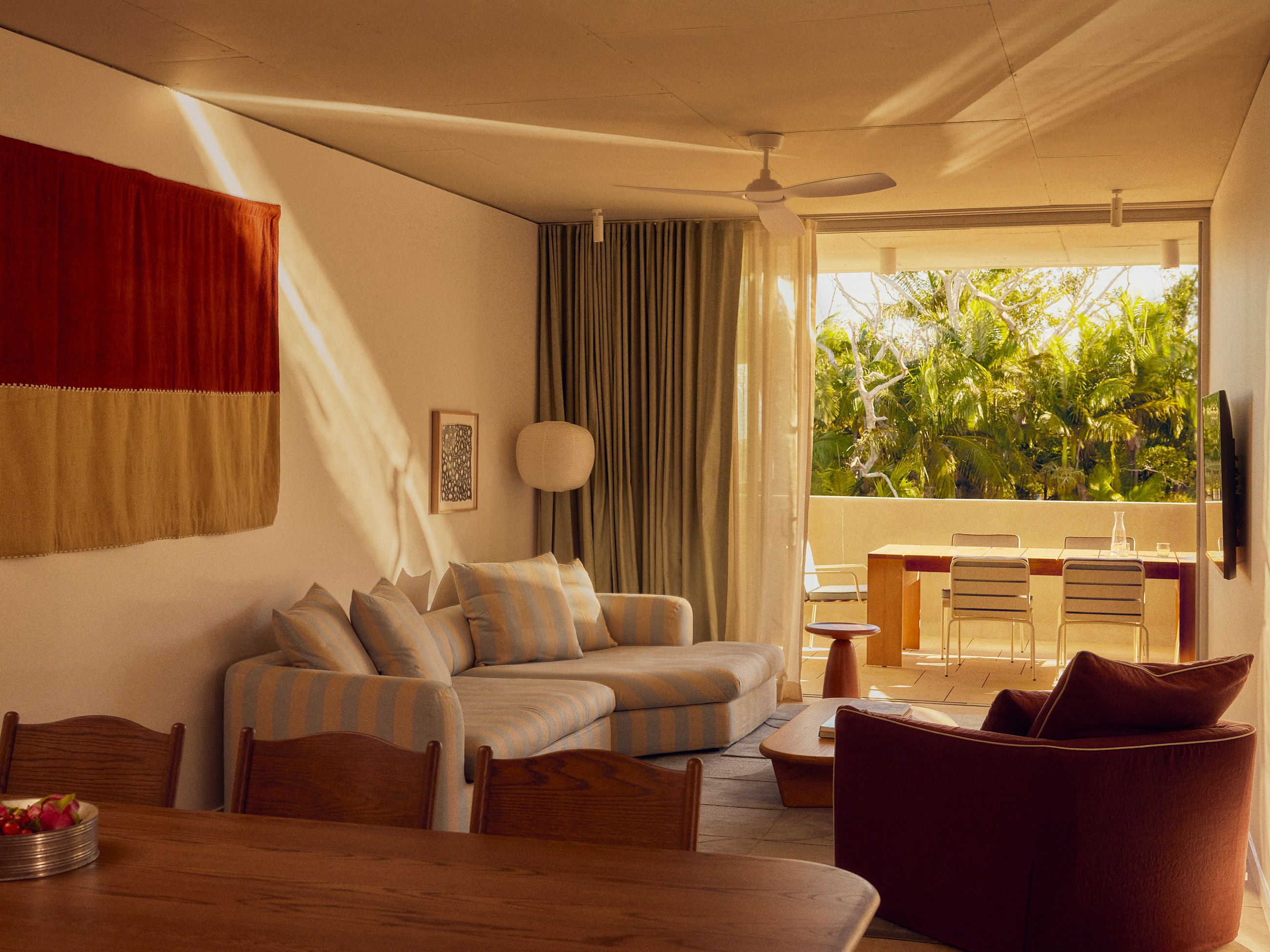 Inside the living room space of The Bonobo by Raes Hotel Residence