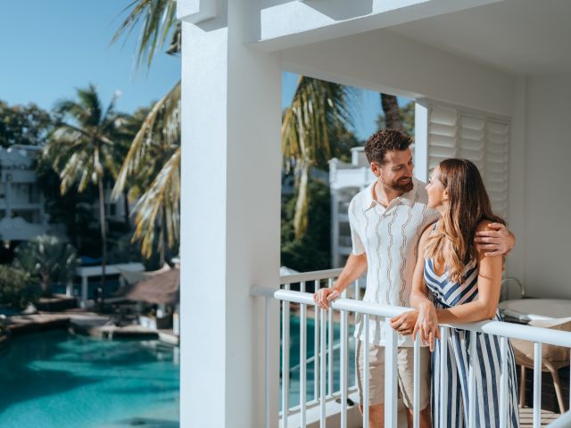 Couple on balcony at Pepper's hotel
