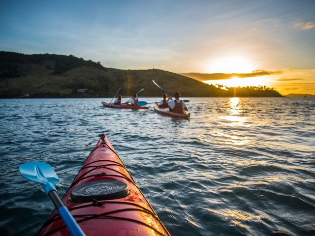 People kayaking.