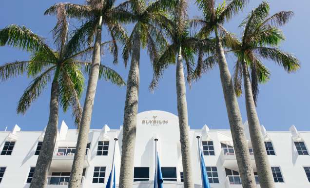 The white-painted exterior of Elysium Noosa Resort.