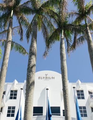 The white-painted exterior of Elysium Noosa Resort.