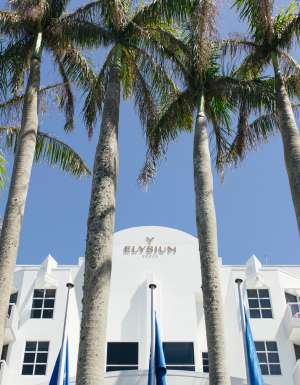 The white-painted exterior of Elysium Noosa Resort.