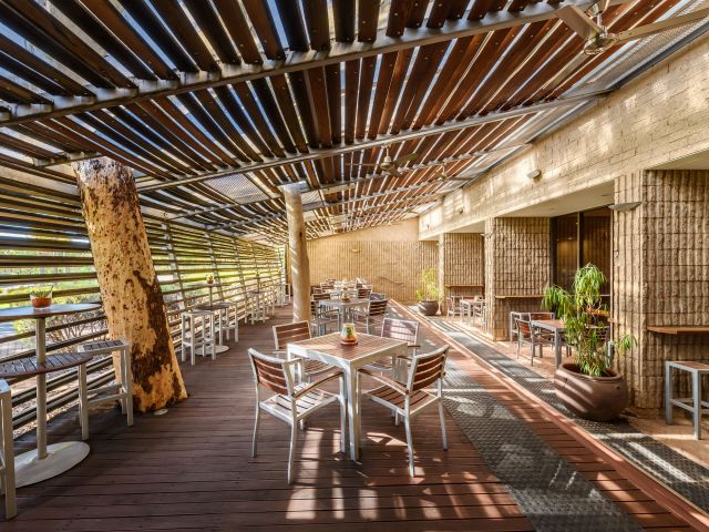 The woody interiors of The Deck Bar, Alice Springs, one of Hilton Hotel Bars.
