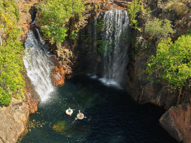 two people floating in Florence Falls, Litchfield