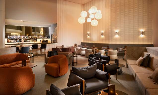 The classic lounge interiors of Palm Court Bar & Lounge at Hilton Darwin.