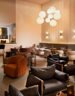 The classic lounge interiors of Palm Court Bar & Lounge at Hilton Darwin.