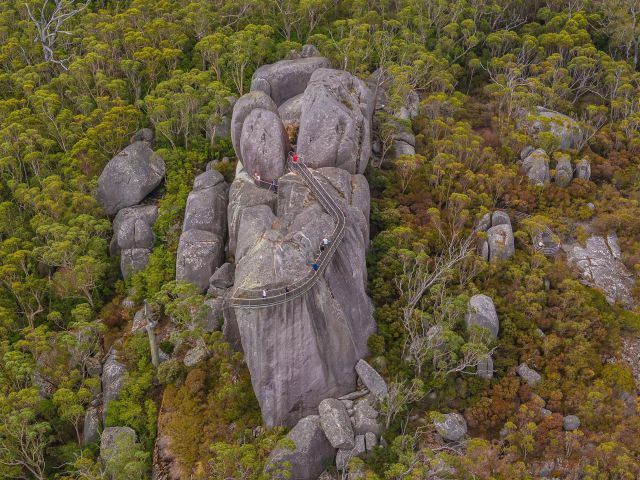 Aerial view of travellers exploring Granite Skywalk, located within Porongurup National Park.