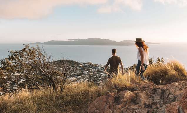Sunrise hike with views of the city below after checking in at Quest Apartment Hotels.