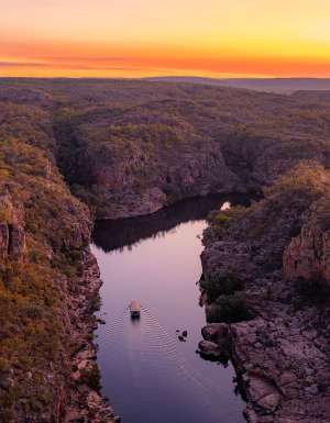 Aerial view of the landscape at Nitmiluk (Katherine) Gorge.Be drawn to the spectacular sandstone country of Nitmiluk National Park and the majestic Nitmiluk (Katherine) Gorge with spectacular cliffs that glow in the changing light.Nitmiluk National Park, just 30km north-east of Katherine, covers a vast area, including 13 impressive gorges carved from the ancient sandstone country which stretch for as far as the eye can see.