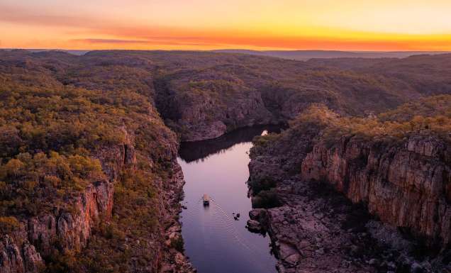 Aerial view of the landscape at Nitmiluk (Katherine) Gorge.Be drawn to the spectacular sandstone country of Nitmiluk National Park and the majestic Nitmiluk (Katherine) Gorge with spectacular cliffs that glow in the changing light.Nitmiluk National Park, just 30km north-east of Katherine, covers a vast area, including 13 impressive gorges carved from the ancient sandstone country which stretch for as far as the eye can see.