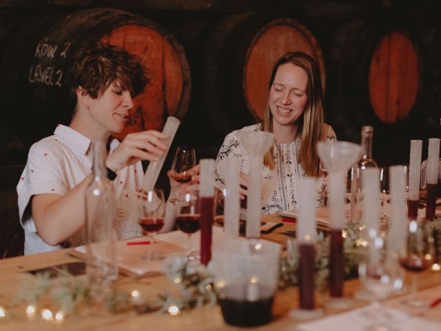 Guests blending their own wines during an interactive winemaking experience.