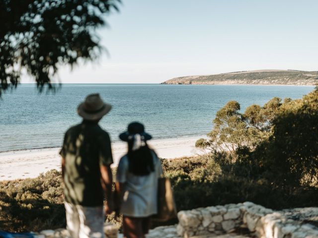 people hiking at emu bay on kangaroo island