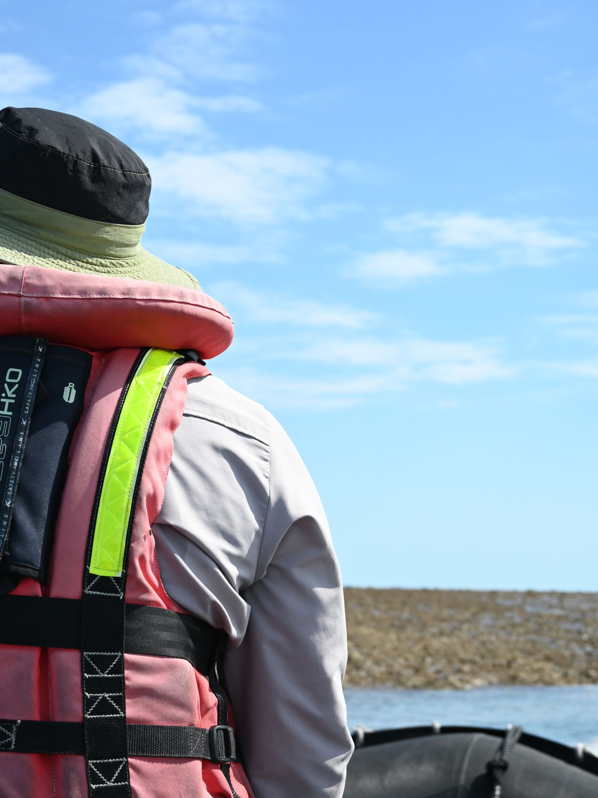 Expedition leader drives the Zodiac to Montgomery Reef