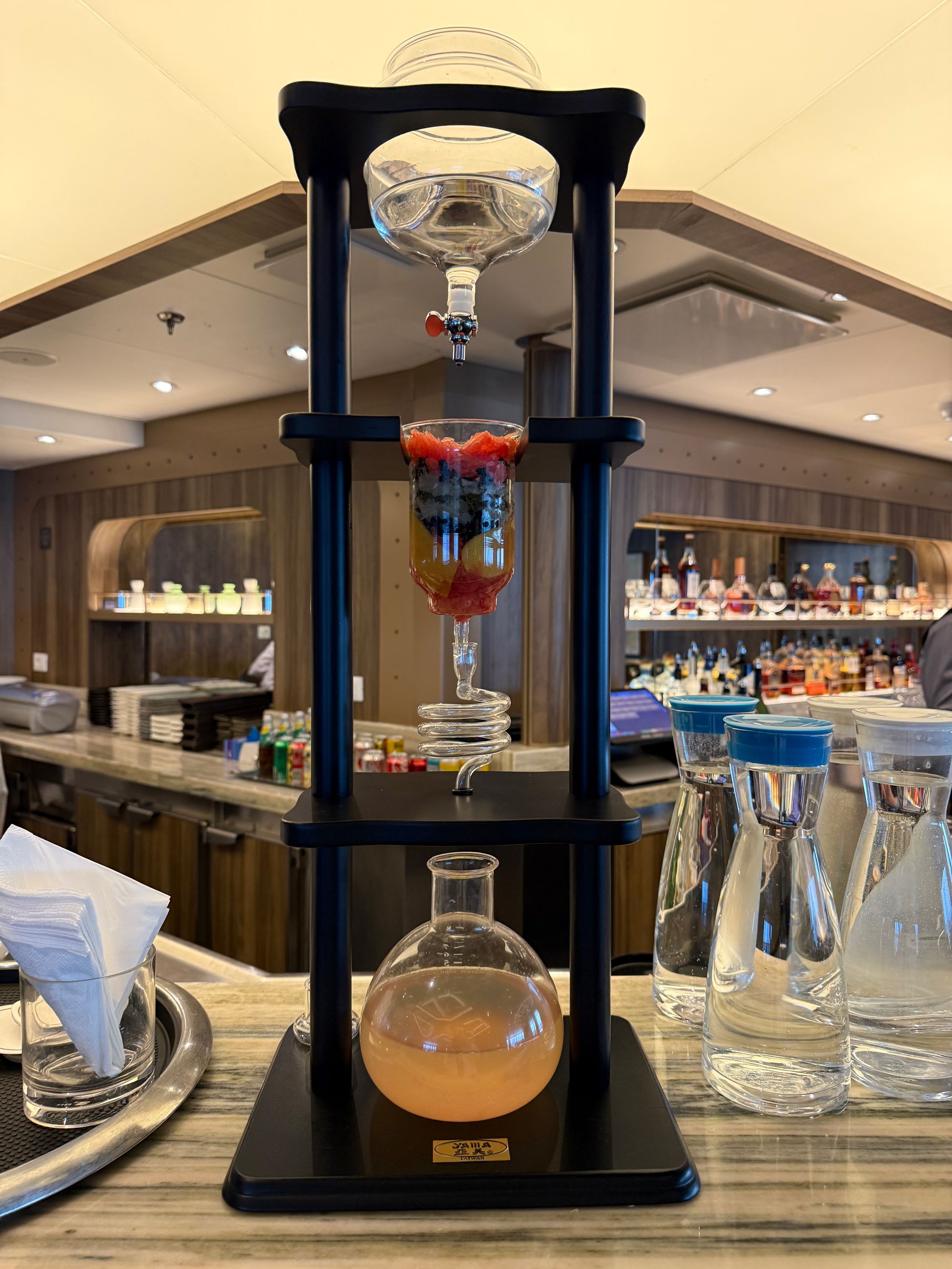 Bartender specialty cocktail infusing on Seabourn Pursuit