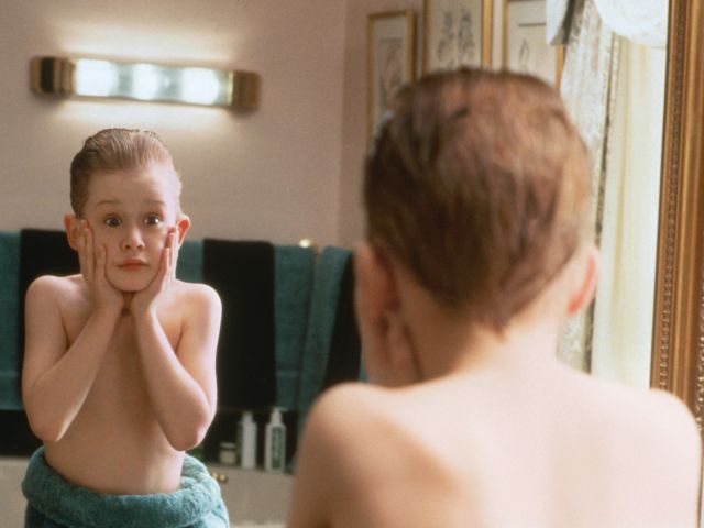 Macaulay Culkin as Kevin McCallister in Home Alone (1990)