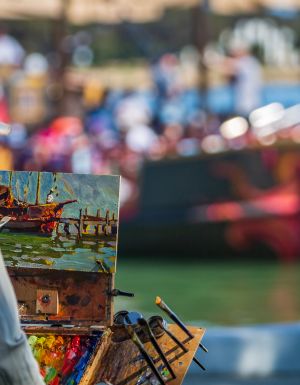 Artist Leon Holmes painting at Plein Air Down Under