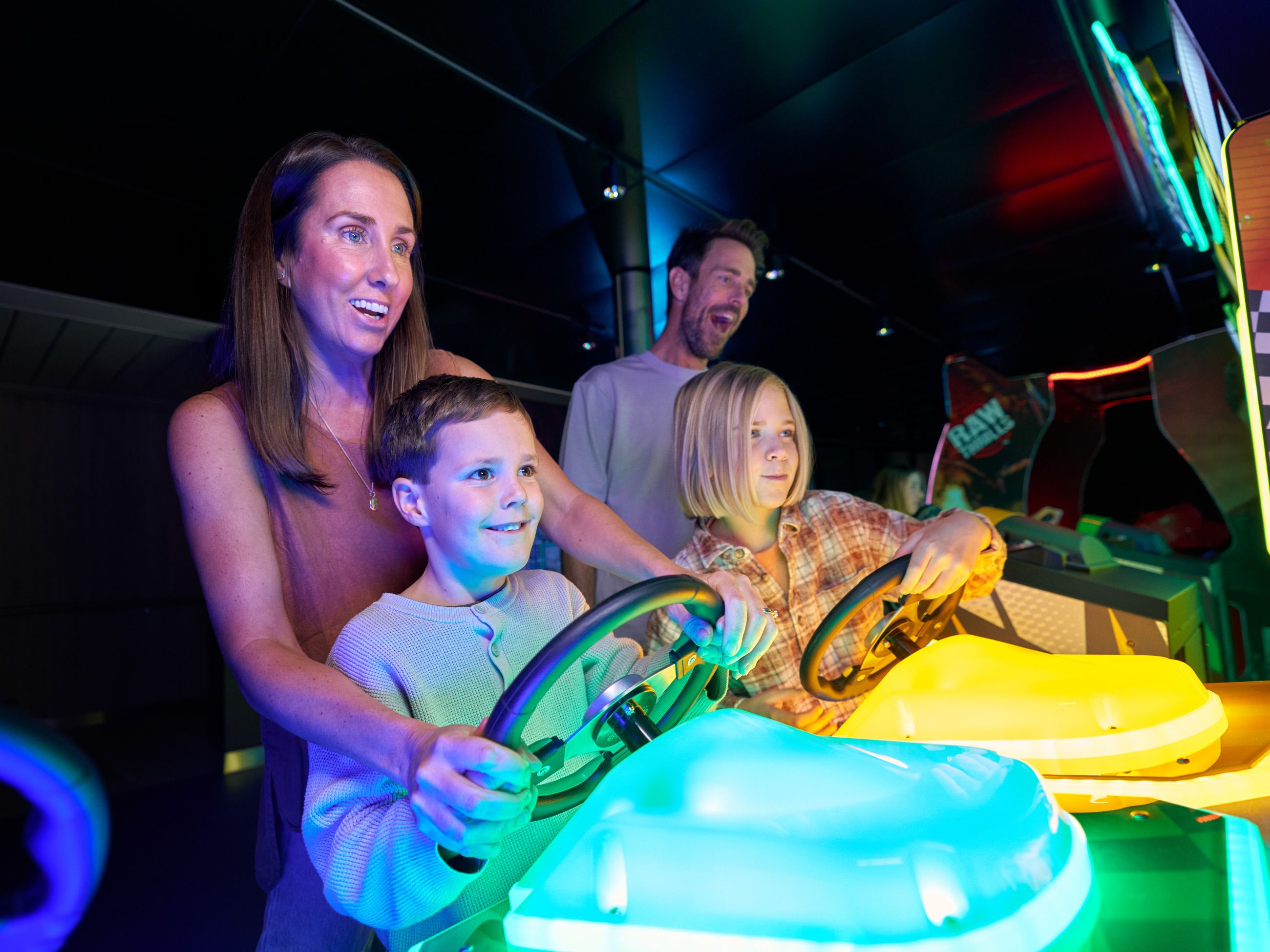 Family plays arcade games onboard Spirit of Tasmania