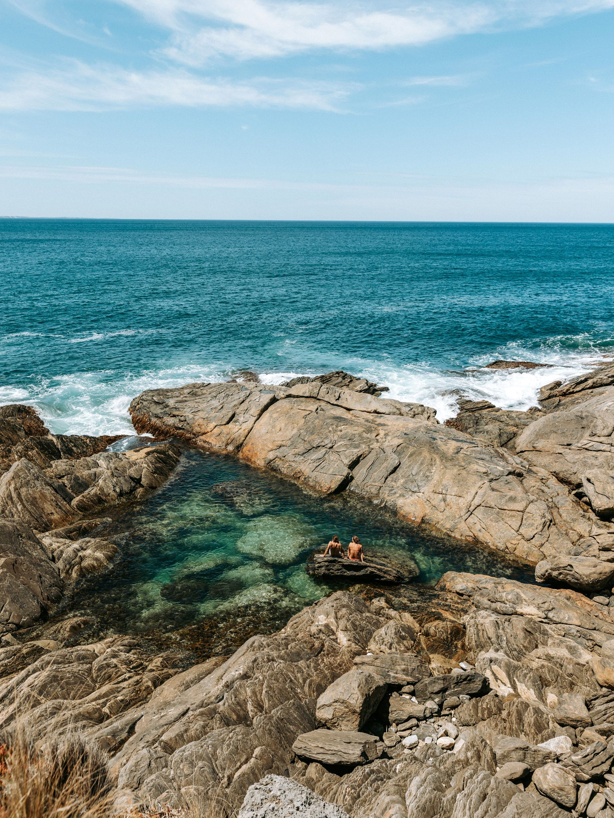 People swimming in rockpool at Vivonne Bay on Kangaroo Island, South Australia