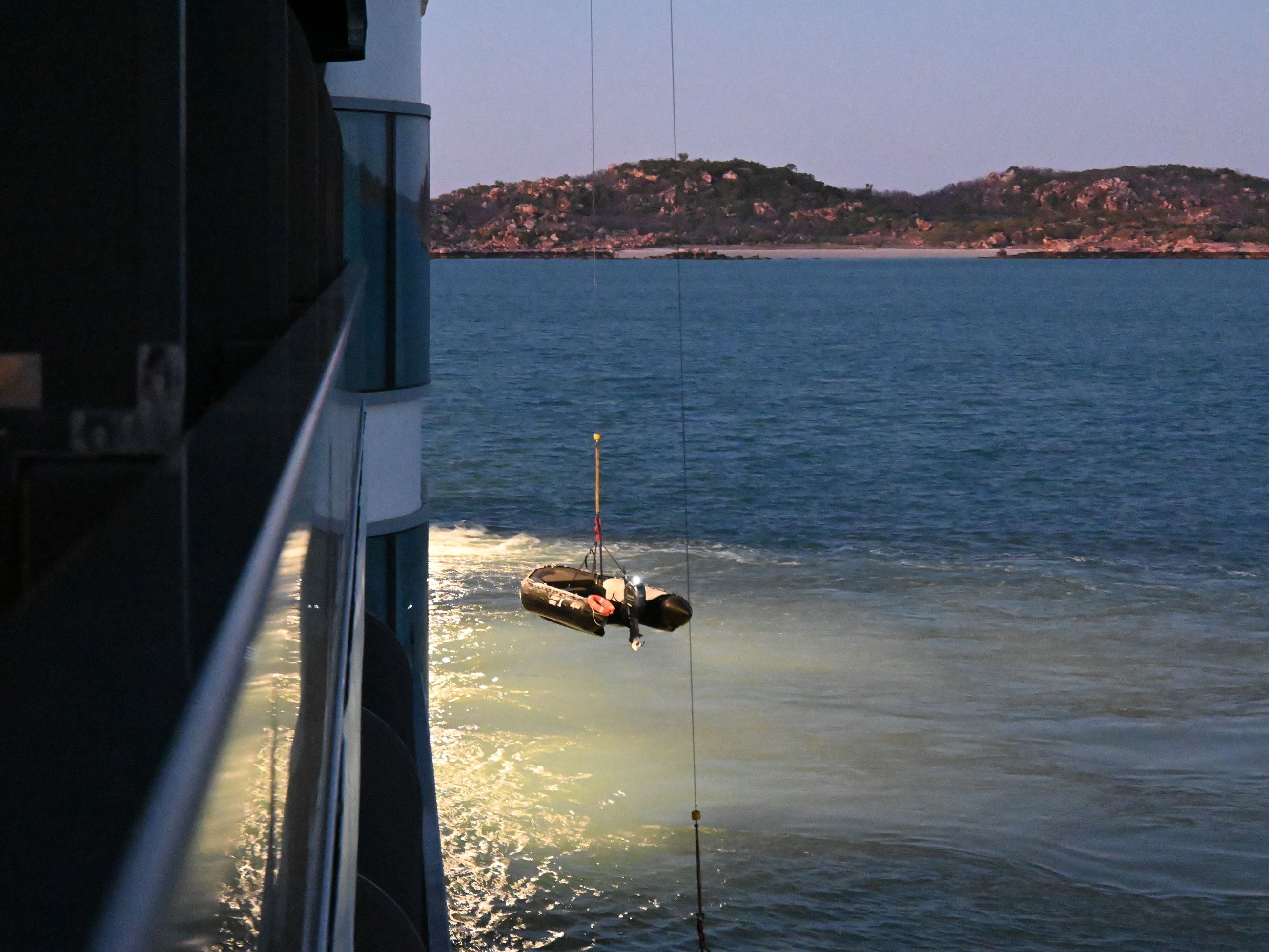Zodiac lowered to the water from Seabourn Pursuit