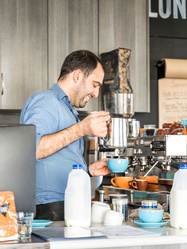 Barista making a coffee order at 61 Balo Cafe, Moree