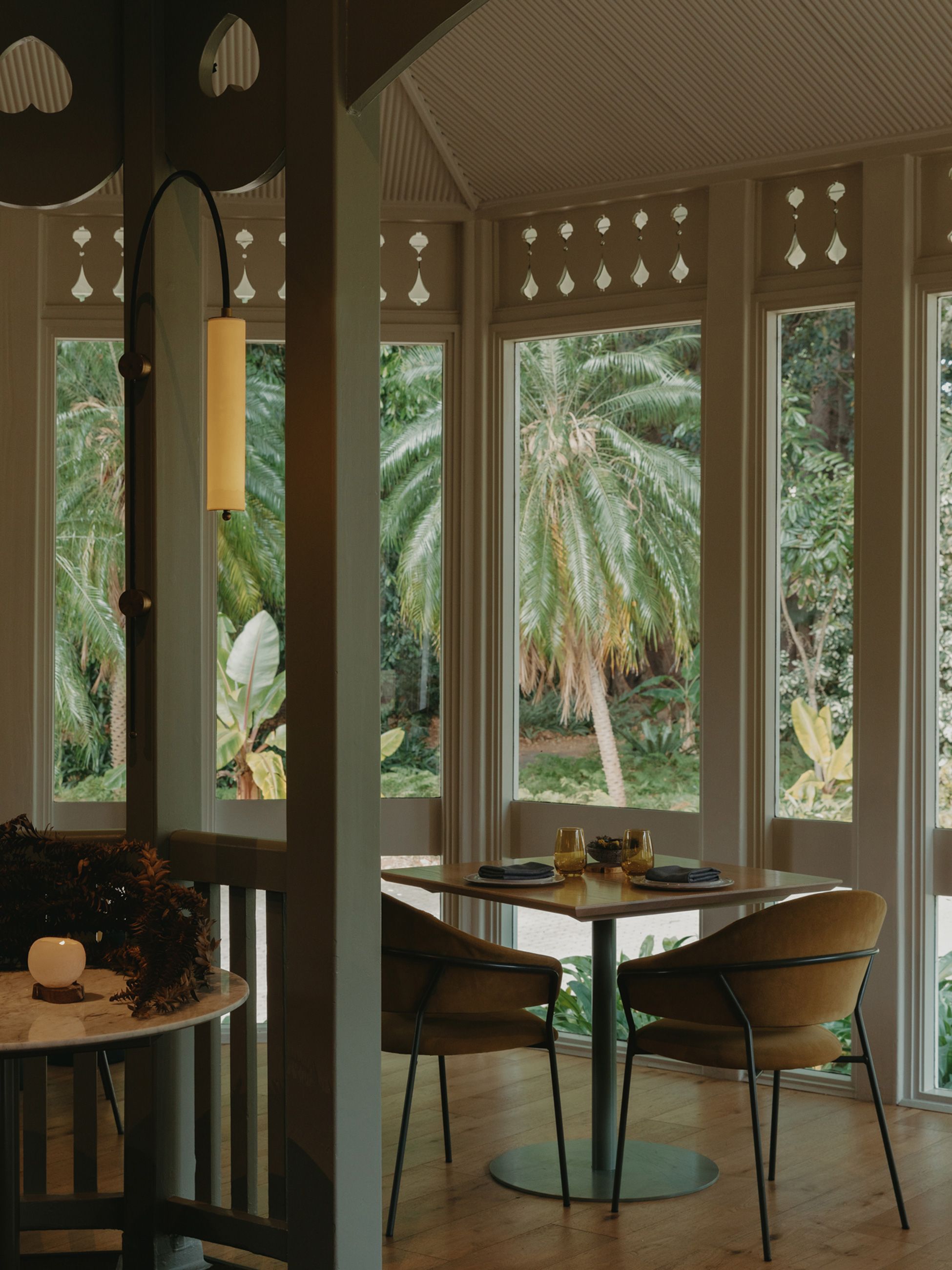 Botanic interior with view of the gardens outside