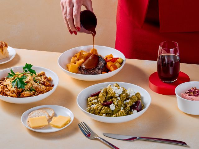 Virgin Australia October 2026 Menu Refresh - Business Class Lunch & Dinner_ Seared Beef Fillet with Rosemary Jus, Beef Bolognaise with Parmesan, Pasta Pesto Salad, Foccacia and Berry Chocolate Cheescake